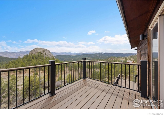 810 Manhead Mountain Dr, Livermore, CO 80536 - wooden terrace with a mountain view