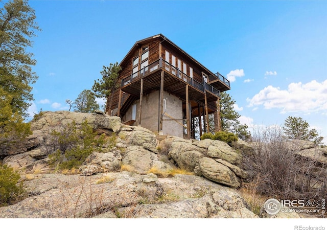 810 Manhead Mountain Dr, Livermore, CO 80536 - view of home's exterior with a deck