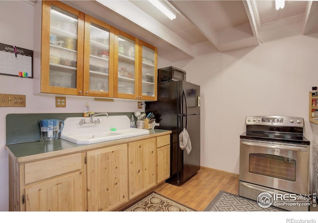 147 Cedar Dr, Lyons, CO 80540 - kitchen with black appliances, a sink, light wood finished floors, light brown cabinetry, and glass insert cabinets