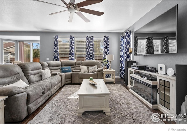 338 Mt Wilson St, Brighton, CO 80601 - living area with a ceiling fan, wood finished floors, and a textured ceiling