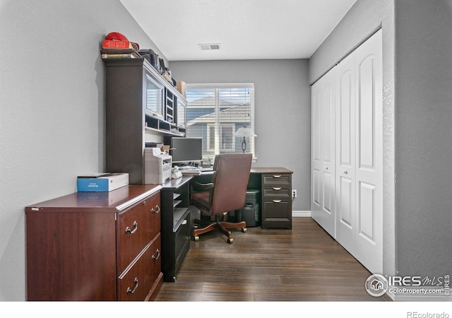338 Mt Wilson St, Brighton, CO 80601 - home office featuring dark wood-style floors