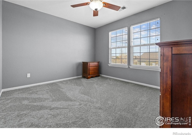 338 Mt Wilson St, Brighton, CO 80601 - carpeted empty room featuring a ceiling fan and baseboards