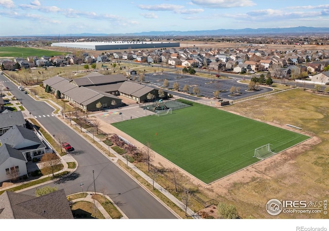 338 Mt Wilson St, Brighton, CO 80601 - aerial perspective of suburban area featuring mountains