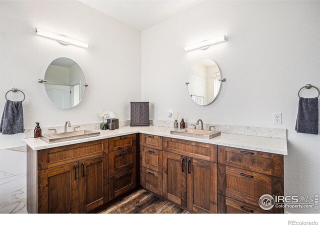 bathroom with double vanity