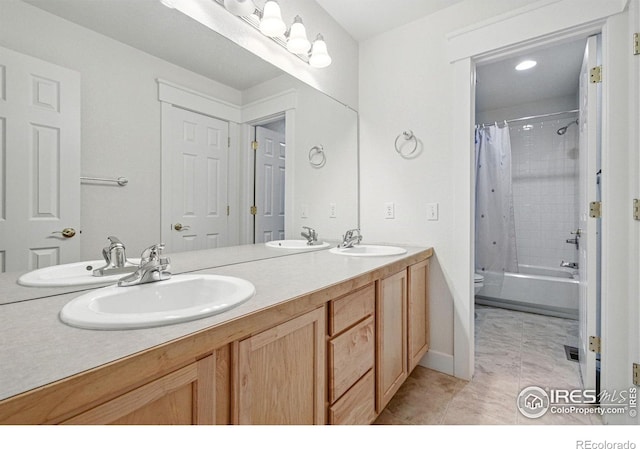 3122 Notabon Ct, Lafayette, CO 80026 - full bathroom featuring a sink, tile patterned floors, toilet, and double vanity