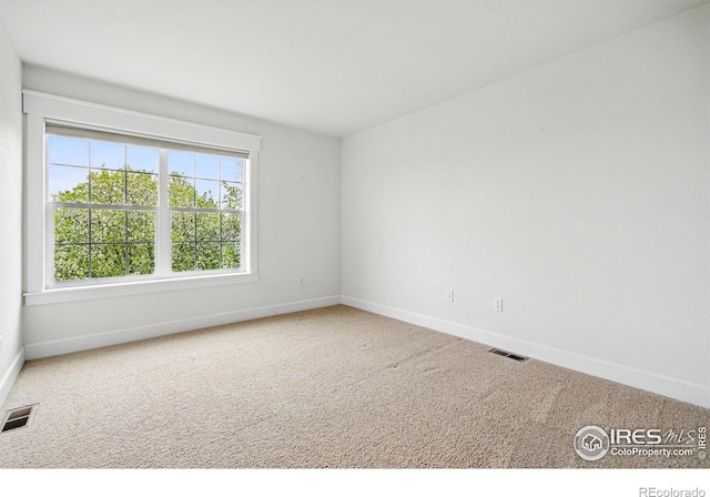 3122 Notabon Ct, Lafayette, CO 80026 - carpeted spare room featuring baseboards and visible vents