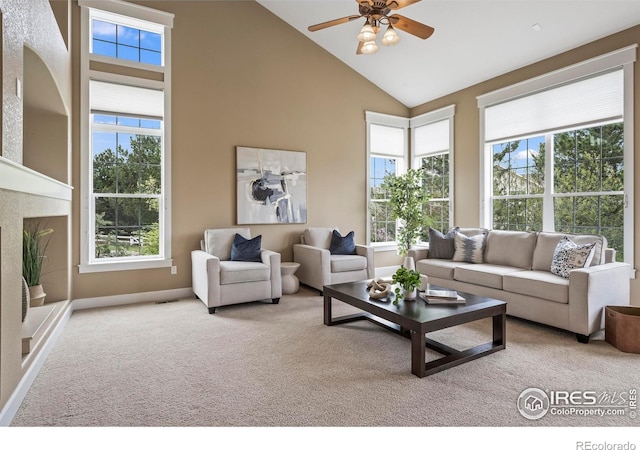 3122 Notabon Ct, Lafayette, CO 80026 - carpeted living room featuring baseboards, high vaulted ceiling, plenty of natural light, and ceiling fan