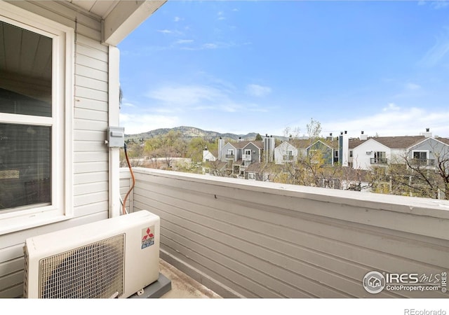 2201 Pearl St Unit 321, Boulder, CO 80302 - balcony featuring a mountain view, ac unit, and a residential view