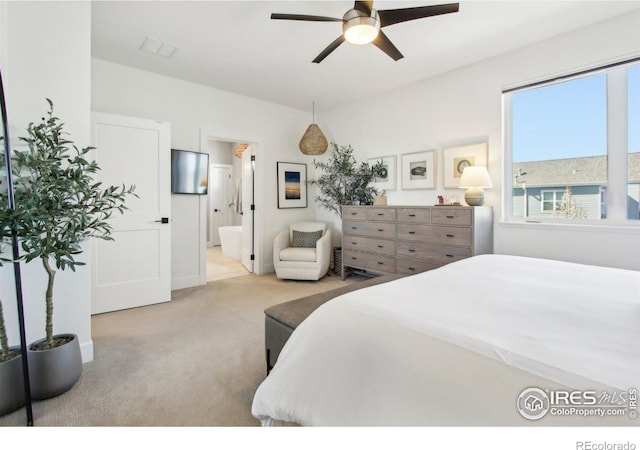 267 Clementina St, Louisville, CO 80027 - bedroom featuring ensuite bath, ceiling fan, and light carpet
