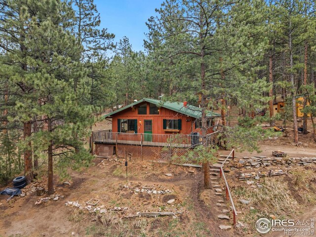 286 Wren Pl, Drake, CO 80515 - exterior space featuring a wooden deck and a wooded view
