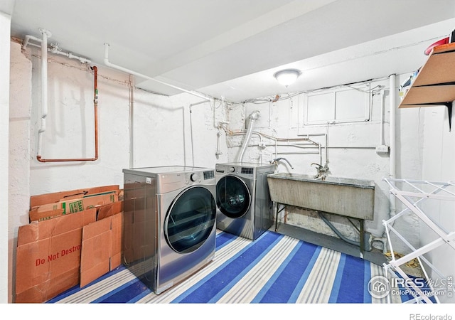 3059 N York St, Denver, CO 80205 - washroom with laundry area, a sink, and washer and dryer