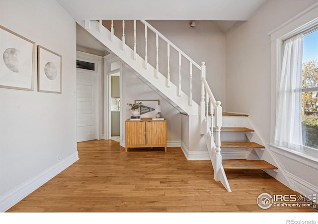 3059 N York St, Denver, CO 80205 - stairs with baseboards and wood finished floors