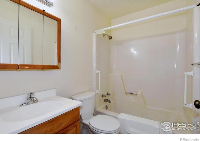 full bath with toilet, vanity, and bathing tub / shower combination