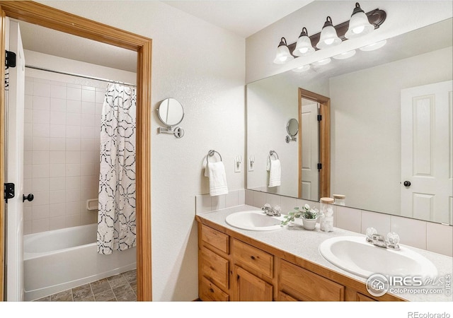 9040 Painted Horse Ln, Wellington, CO 80549 - full bathroom with shower / bath combination with curtain, a sink, and double vanity