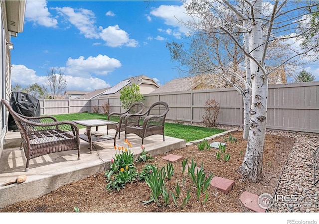 9040 Painted Horse Ln, Wellington, CO 80549 - view of yard featuring a fenced backyard and a patio