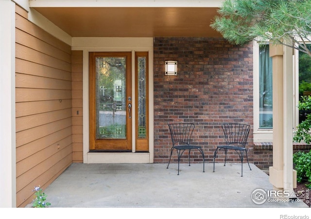 5285 Gallatin Pl, Boulder, CO 80303 - view of exterior entry featuring brick siding