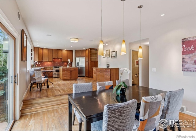 5285 Gallatin Pl, Boulder, CO 80303 - dining room with baseboards, light wood-style floors, visible vents, and recessed lighting