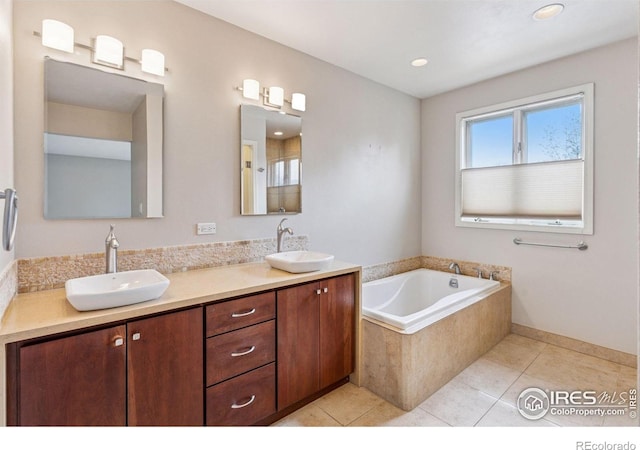 5285 Gallatin Pl, Boulder, CO 80303 - full bathroom with tile patterned flooring, a garden tub, a sink, and double vanity