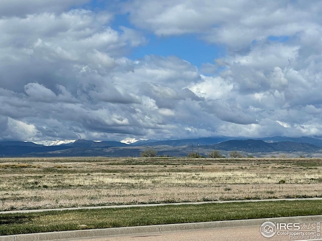 view of mountain feature with a rural view