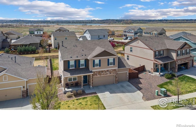 6747 Grainery Rd, Timnath, CO 80547 - aerial perspective of suburban area