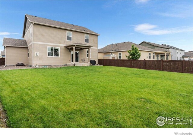6747 Grainery Rd, Timnath, CO 80547 - view of rear view of house