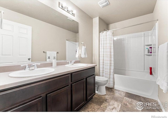 6747 Grainery Rd, Timnath, CO 80547 - full bathroom featuring toilet, double vanity, and shower / tub combo