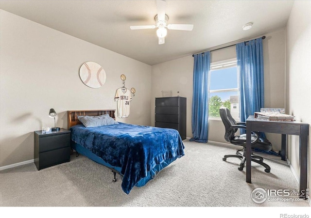 6747 Grainery Rd, Timnath, CO 80547 - bedroom with carpet flooring, baseboards, a desk, and a ceiling fan