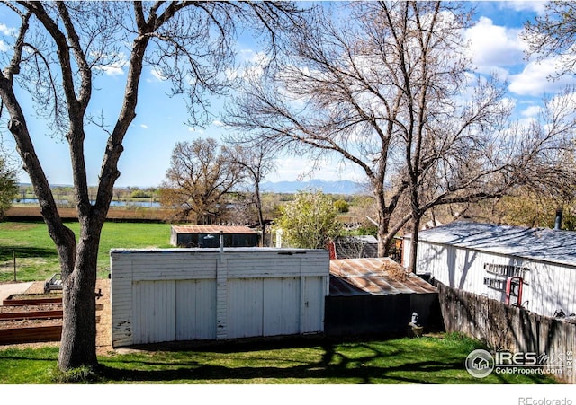 view of outbuilding featuring a mountain view