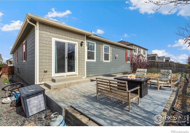 2000 Rose Petal Dr, Windsor, CO 80550 - wooden terrace with a fire pit and entry steps