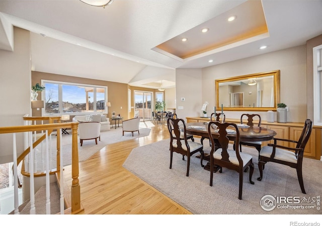 dining room with recessed lighting and light wood-style floors