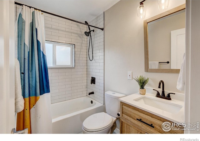 full bathroom featuring vanity, shower / bathtub combination with curtain, and toilet