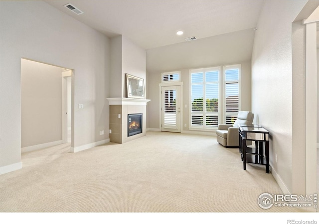 2751 Iowa Dr Unit 305, Fort Collins, CO 80525 - living area with carpet flooring, a fireplace, and baseboards