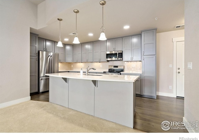 2751 Iowa Dr Unit 305, Fort Collins, CO 80525 - kitchen with stainless steel appliances, a sink, light countertops, tasteful backsplash, and recessed lighting