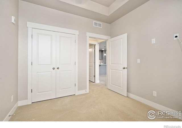 2751 Iowa Dr Unit 305, Fort Collins, CO 80525 - unfurnished bedroom with carpet floors, baseboards, and a closet