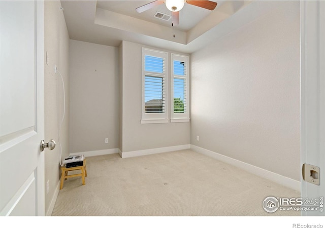 2751 Iowa Dr Unit 305, Fort Collins, CO 80525 - spare room featuring carpet floors, a raised ceiling, a ceiling fan, and baseboards