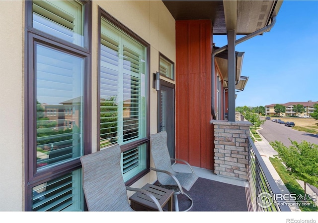 2751 Iowa Dr Unit 305, Fort Collins, CO 80525 - balcony featuring covered porch