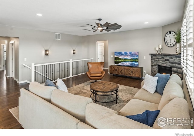 2121 Covered Bridge Pkwy, Windsor, CO 80550 - living room featuring a ceiling fan, visible vents, dark wood finished floors, and recessed lighting