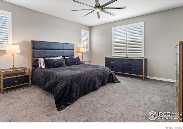 2121 Covered Bridge Pkwy, Windsor, CO 80550 - carpeted bedroom featuring a ceiling fan and baseboards
