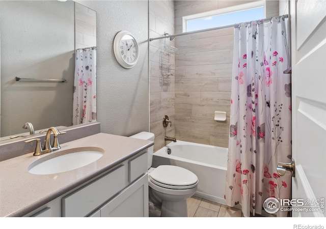 2121 Covered Bridge Pkwy, Windsor, CO 80550 - full bathroom featuring toilet, a textured wall, shower / bath combo, and vanity