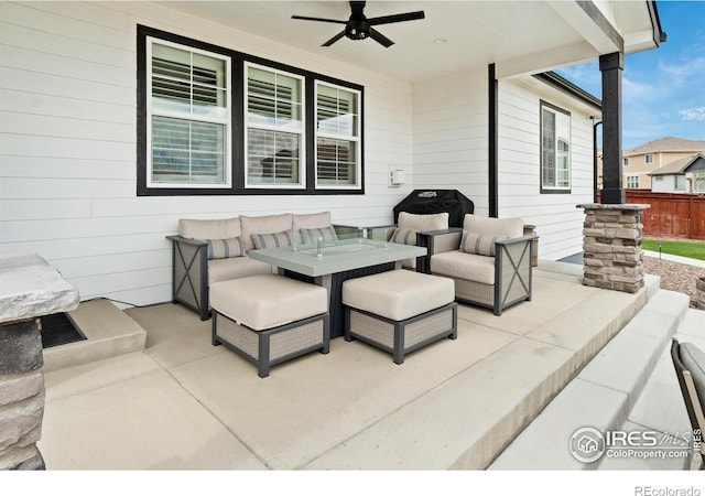2121 Covered Bridge Pkwy, Windsor, CO 80550 - view of patio with an outdoor living space, a ceiling fan, and fence