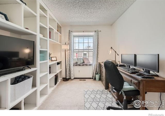 15503 E Wyoming Dr Unit G, Aurora, CO 80017 - carpeted office space featuring a textured ceiling