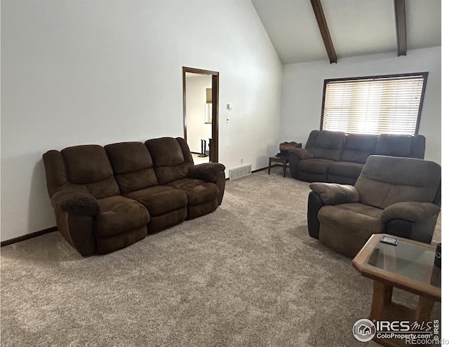425 Stanford St, Brush, CO 80723 - carpeted living room featuring beam ceiling, baseboards, and high vaulted ceiling