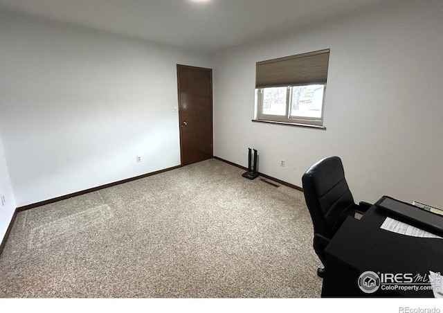 425 Stanford St, Brush, CO 80723 - carpeted office featuring baseboards