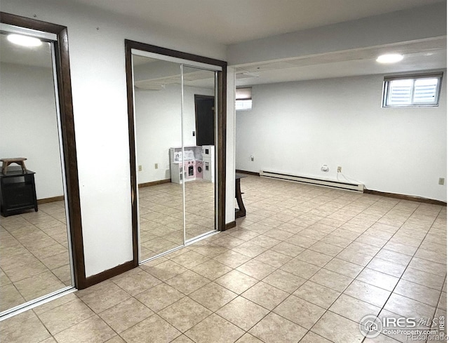425 Stanford St, Brush, CO 80723 - basement featuring baseboard heating and light tile patterned floors