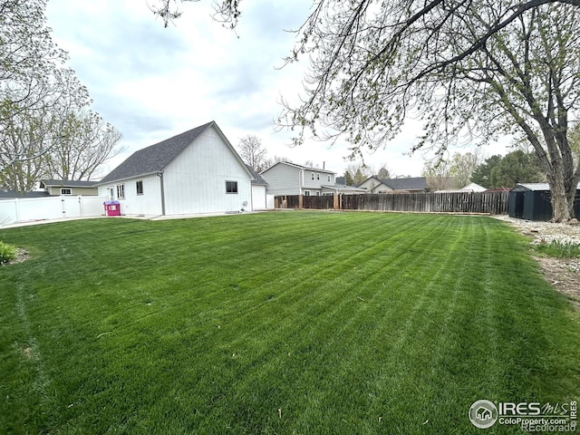 425 Stanford St, Brush, CO 80723 - view of yard featuring an outdoor structure and a storage shed