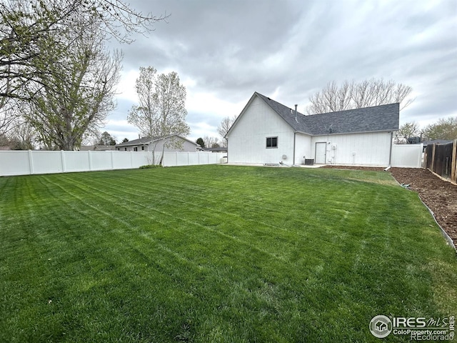 425 Stanford St, Brush, CO 80723 - back of house with roof with shingles