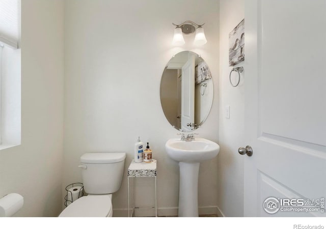3759 Catmint St, Wellington, CO 80549 - bathroom featuring a sink and toilet