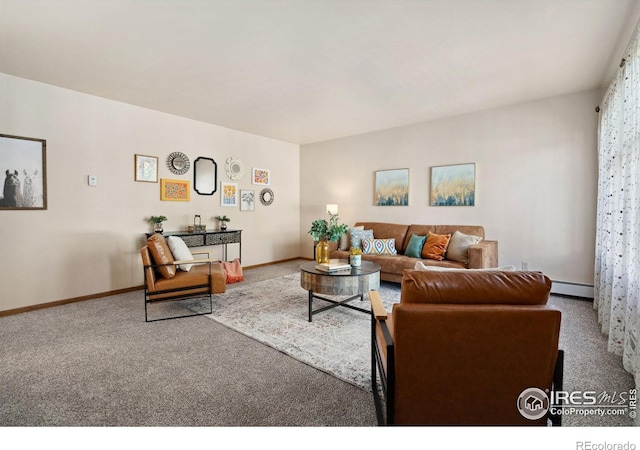 4560 Larkbunting Dr Unit 2B, Fort Collins, CO 80526 - living area with carpet floors, a baseboard heating unit, and baseboards