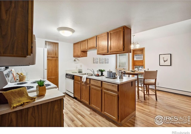 4560 Larkbunting Dr Unit 2B, Fort Collins, CO 80526 - kitchen with light wood-type flooring, light countertops, and a sink