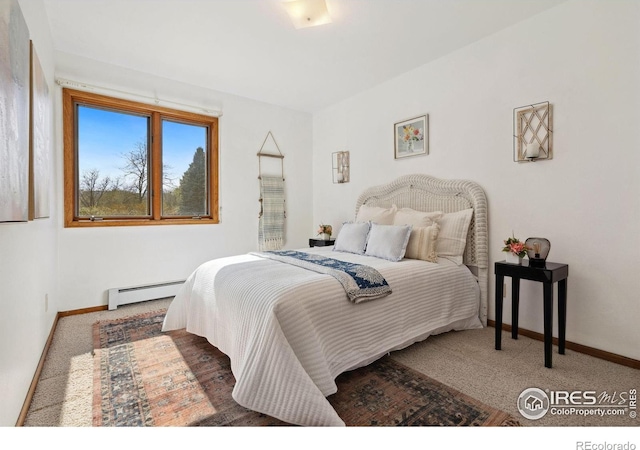 4560 Larkbunting Dr Unit 2B, Fort Collins, CO 80526 - bedroom featuring a baseboard radiator, baseboards, and carpet flooring